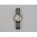An Omega stainless steel cased manual wind gent's wristwatch, silvered dial heavily worn, centre