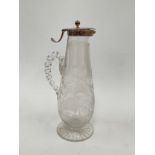 A Victorian etched crystal glass claret jug with rope twist handle, the top with Thompsons patent