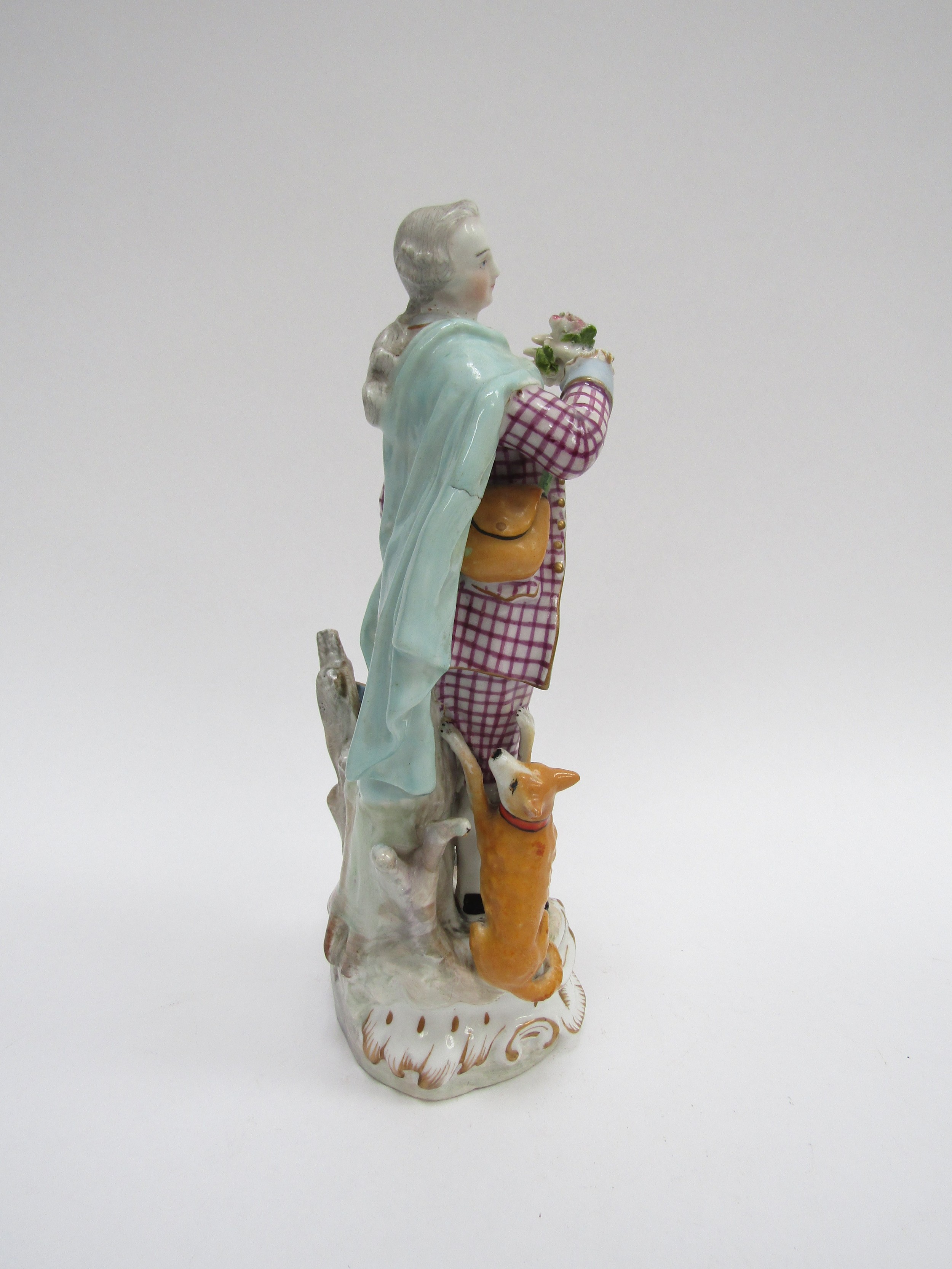 A late 18th/ early 19th Century porcelain figure of a gent carrying portrait miniature - Image 3 of 4