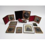 Various Ambrotypes depicting people in exterior and interior settings and a Daguerreotype of three