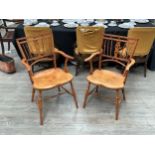 A pair of 20th Century Mendlesham chairs, fruitwood spindle and pierced splat back over an ergonomic