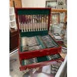 A canteen of Kings pattern silver cutlery for 12 place settings and four serving spoons, 88 Pieces