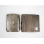 Two silver cigarette cases, both with engine turned decoration and vacant cartouches, Birmingham