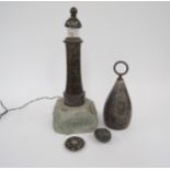 A Cornish Serpentine stone lighthouse lamp, doorstop, polished egg and compass (4)
