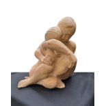 A studio ceramic sculptural maquette figural group of an embracing couple. Indistinctly signed to