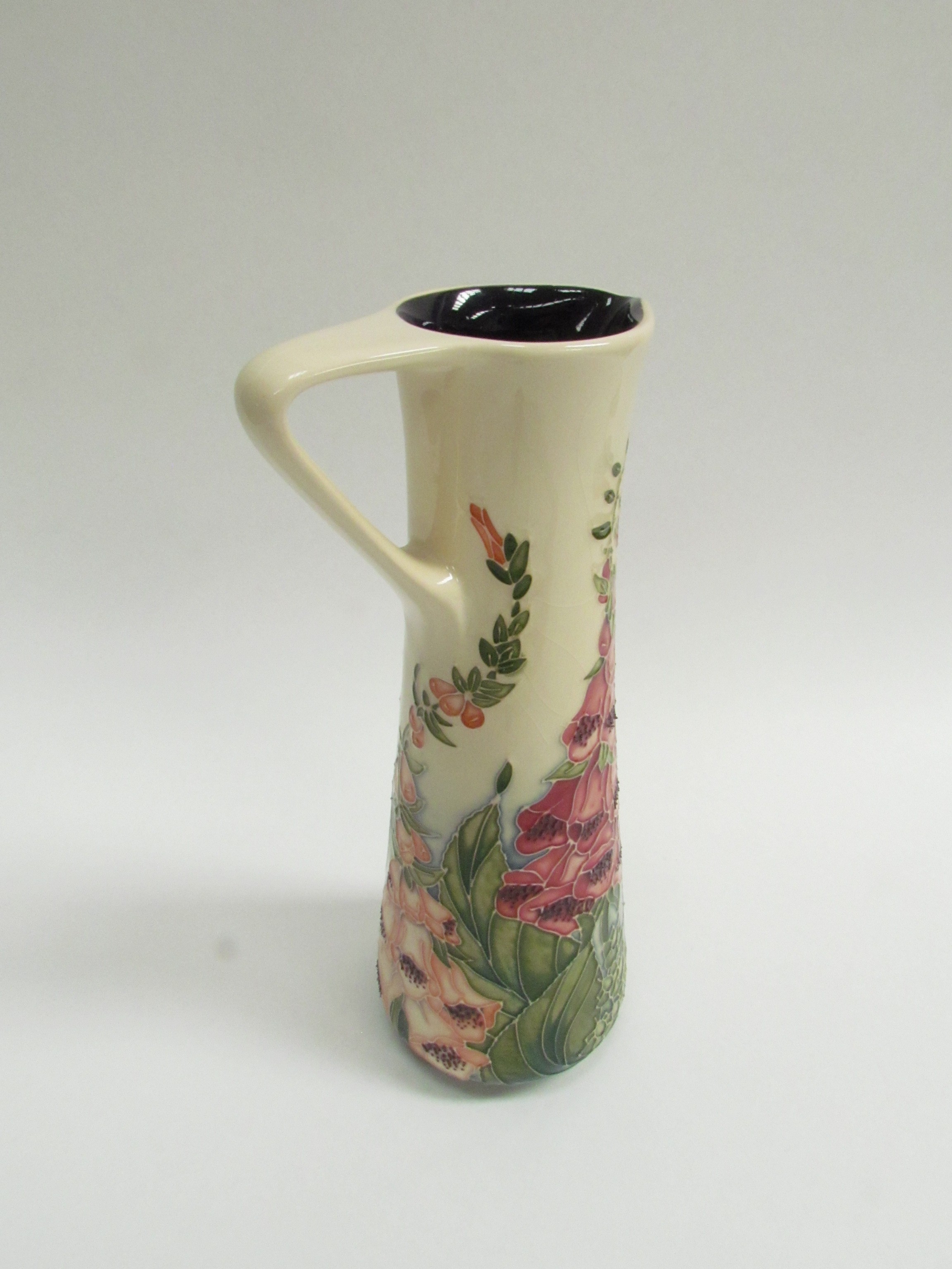 A Moorcroft Foxglove pattern slender jug by Rachel Bishop No.420 (crazing to cream ground) 24.5cm - Image 2 of 3