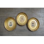 Three Edwardian miniature portraits in oval gilt frames. The frames measuring 21cm x 18cm