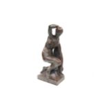 An Art Deco terracotta statue of a nude crouching lady C1920. Signed Francois-Emile Popineau, 49cm