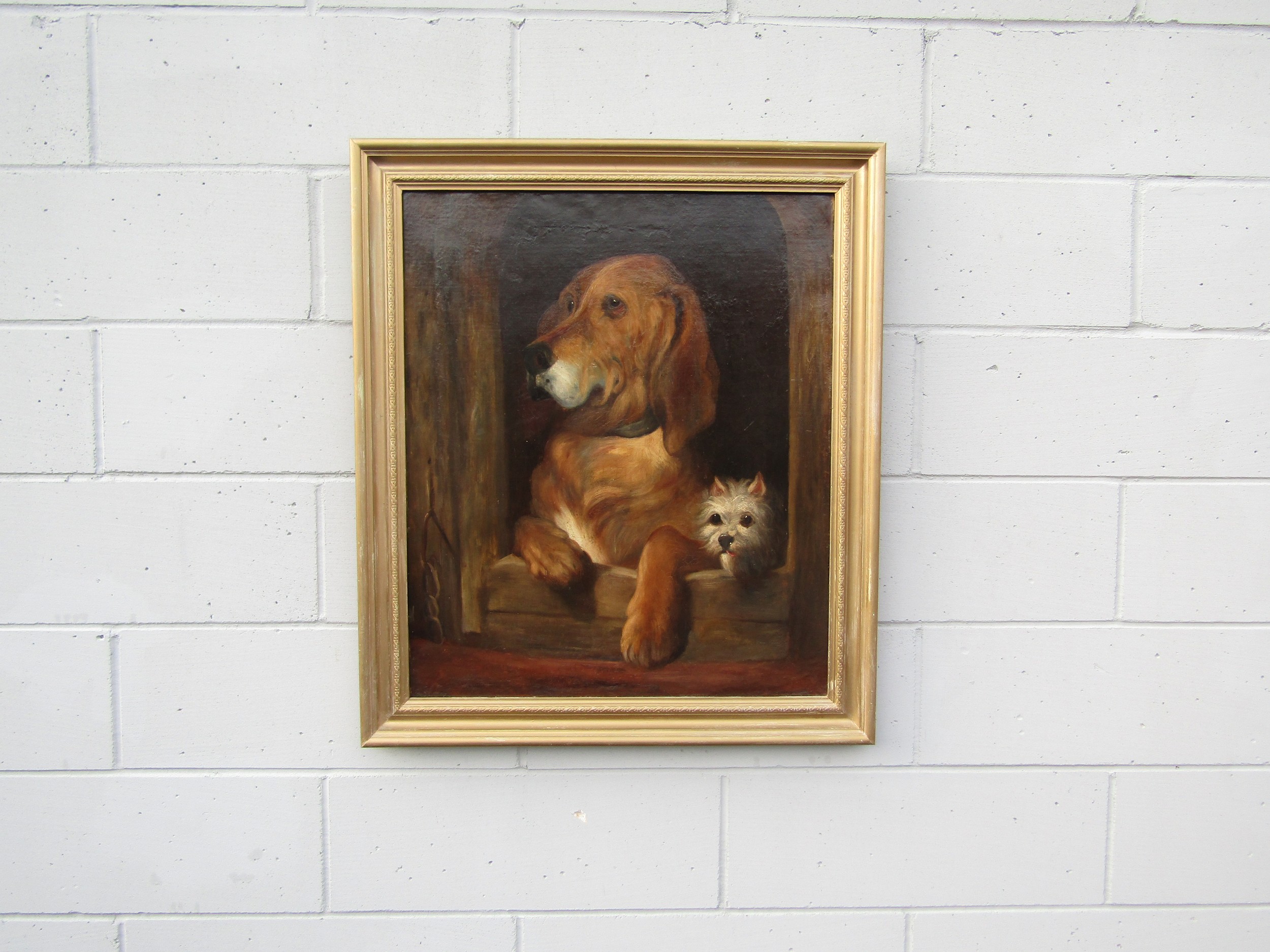 After Landseer - An oil on canvas of 'Dignity & Impudence' depicting two dogs. Unsigned. Set in a