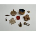 A locket, pendant, ring box, earrings and intaglio crest