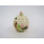 A Clarice Cliff Newport pottery lidded preserve jar in the Waterlily design, 11cm tall