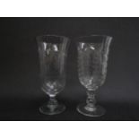 Two cut glass celery vases, 20.5cm tall