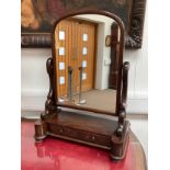 A 19th Century style mahogany swing mirror with two jewellery drawers, 78cm tall