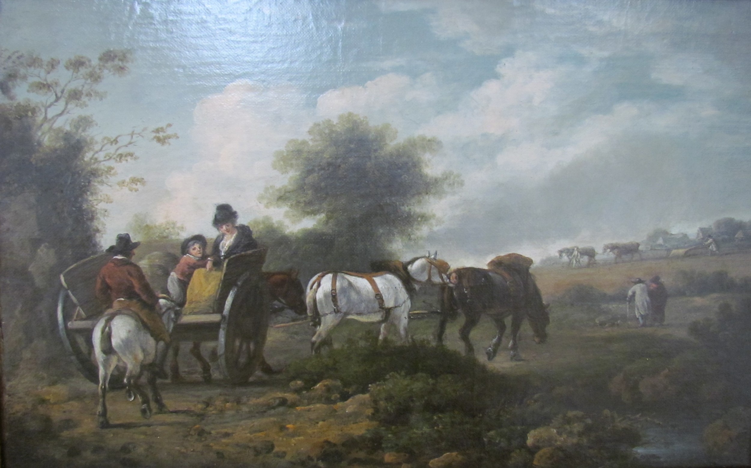 English School early 19th Century rural landscape depicting family in wagon on road with walking