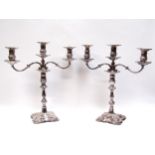 A pair of silver Roberts and Belk table centrepiece three sconce candlesticks, both converting to