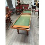 A late Victorian folding billiard table on stand with turned legs. Ivory license reference for