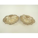 A pair of Richard Richardson silver pierced bon-bon dishes with acanthus, scallop and floral detail,