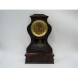 A Mid 19th Century French mantel clock in serpentine case, movement marked Dumoulinneuf/Molle a
