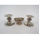 A pair of L.J. Millington silver squat form candlesticks, stamped Birmingham 925, together with a