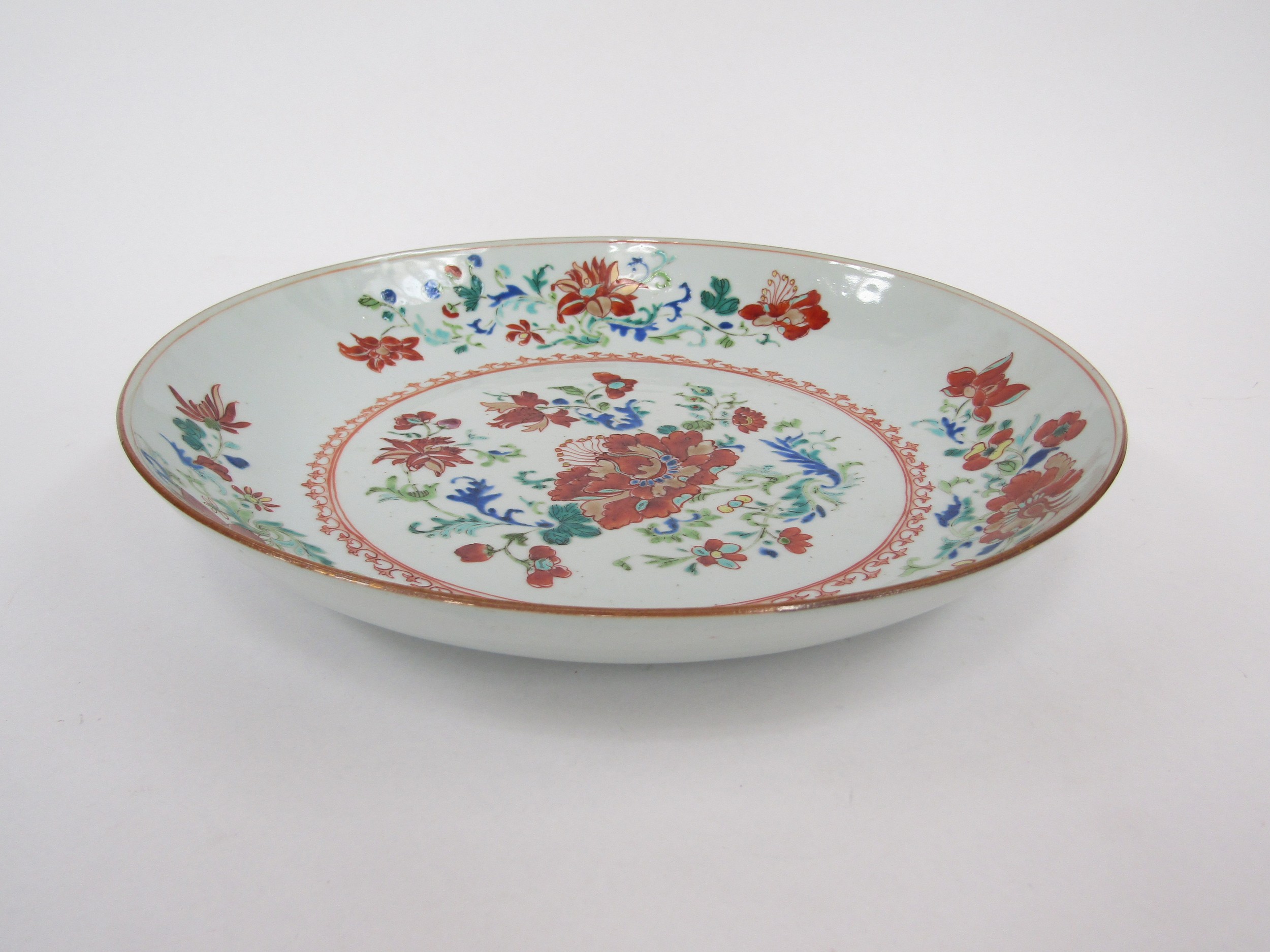 An 18th Century Famille Rose porcelain shallow bowl, red border and floral sprays enriched with - Image 2 of 3