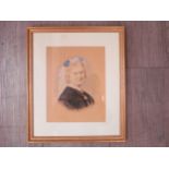 A hand coloured photo of elderly lady in black dress, 22cm x 17cm