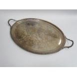 A Charles Stuart Harris silver oval tea tray with beaded edge, twin handles, 47cm x 35.5cm (