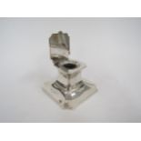 A William Neale silver cup stand inkwell marked Birmingham 1910, with liner, marks rubbed, 5cm x 8cm
