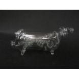 A 20th Century clear glass hand blown figure of sow with litter of graduating piglets within, 25cm
