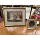 Two framed family photos