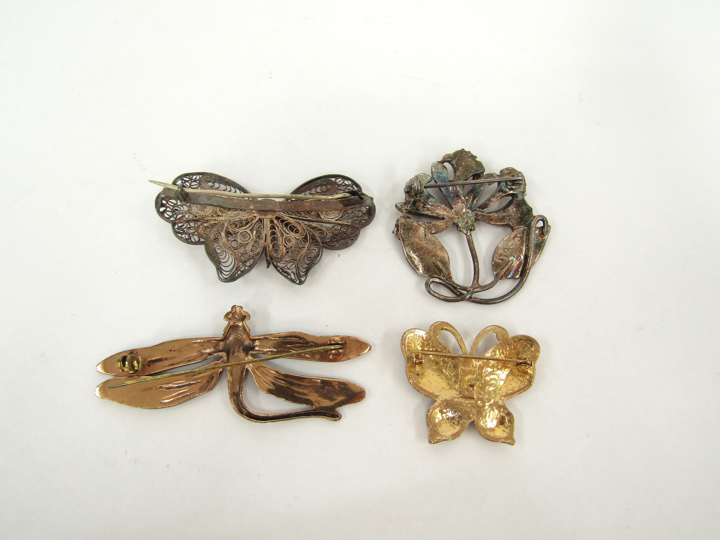 Four brooches including dragonfly, filigree moth, butterfly and MASJ floral spray dated 87 - Image 2 of 2