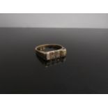 A gold ring set with eight old cut diamonds in two rows. Size X, 3.5g