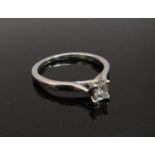 A platinum square cut diamond solitaire, 0.23ct, with certificate. Size J, 2.1g