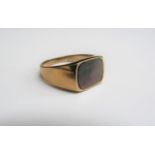 A 9ct gold signet ring with mother-of-pearl front. Size X/Y, 5.5g