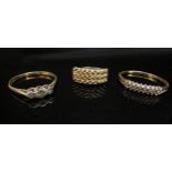 Three 9ct gold rings, two set with diamond chips, 6.4g