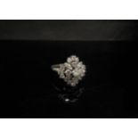 A platinum set diamond cluster ring 2ct total approx. unmarked. Size M/ N, 8.7g