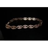A 9ct rose gold bracelet made from a watch chain, 19cm long, 19.8g