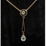 A gold necklace hung with an aquamarine double drop pendant, stamped 9c, 42cm long, 4cm long drop,