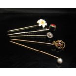 Six various stick pins including pearl set, unmarked