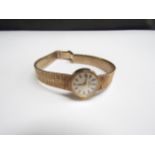 A 9ct gold Tissot lady's wristwatch, 23.3g