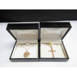 A gold St Christopher hung on chain stamped 375, 46cm long and a cross pendant hung on 9ct gold