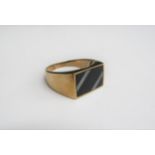 A 9ct gold signet ring with black onyx front. Size Y/Z, 6.6g