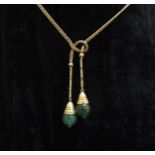 A gold chain stamped 585 hung with two jade drops, 40cm long, 7.3g