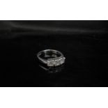 An 18ct white gold three stone diamond ring, 1ct total approx. Size M, 4.2g