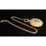 A 9ct gold plated picture locket with monogrammed shield front, hung on chain, 40cm long, 1.8g chain