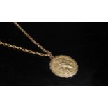 A 9ct gold St. Christopher on 9ct gold chain, 46cm long, 6.2g