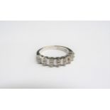 An 18ct white gold ring, set with 14 diamonds. Size N, 3.8g