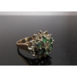 A 9ct gold emerald dress ring. Size T, 6.3g