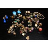 Twenty-two pairs of various earrings including 9ct gold examples, pearl and emerald