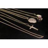Five gold chains, various lengths including 9ct and 9k examples, with four pendants including 9ct