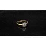 A diamond daisy ring, unmarked gold. Size O/P, 1.9g